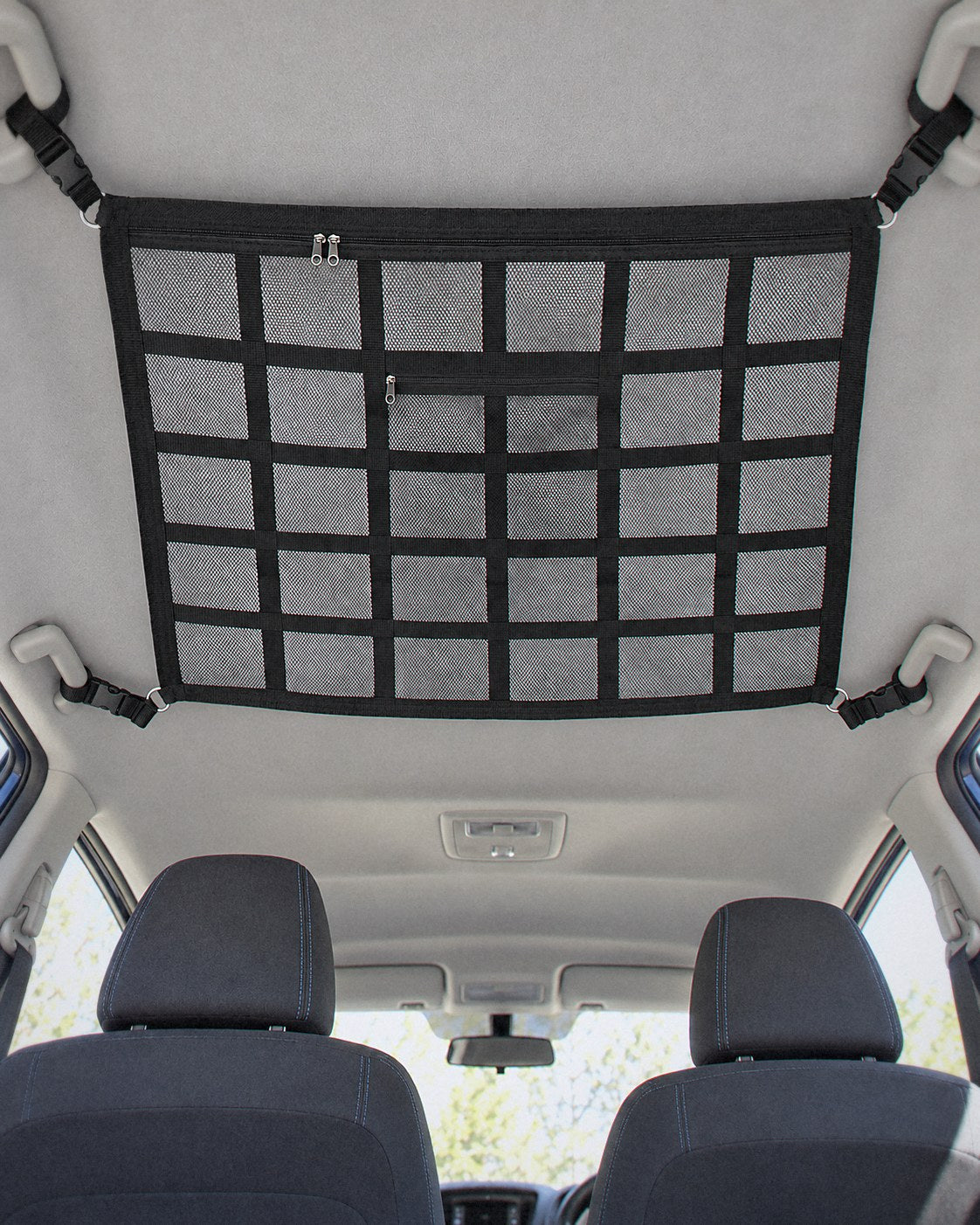 Empty overhead cargo net strapped to four grab handles, seen from the back seat